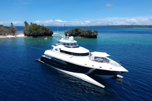 Motor Yacht Spirit anchored off shoal island